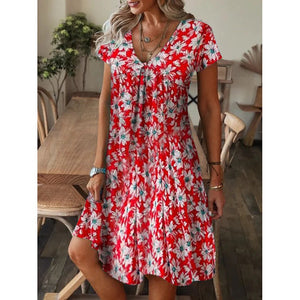Vestido de manga corta con escote en pico y estampado holgado - España