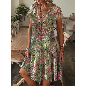 Vestido de manga corta con escote en pico y estampado holgado - España