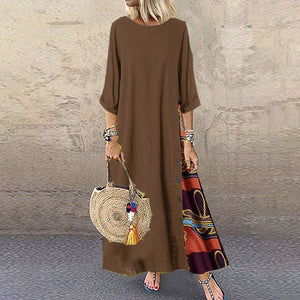 Colarinho redondo floral de outono com botões de bloqueio de cor e vestido de mangas patchwork. Solto e confortável, com cores de retalhos para um ar de elegância e generosidade. Disponível em 12 cores à escolha.
