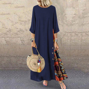 Colarinho redondo floral de outono com botões de bloqueio de cor e vestido de mangas patchwork. Solto e confortável, com cores de retalhos para um ar de elegância e generosidade. Disponível em 12 cores à escolha.